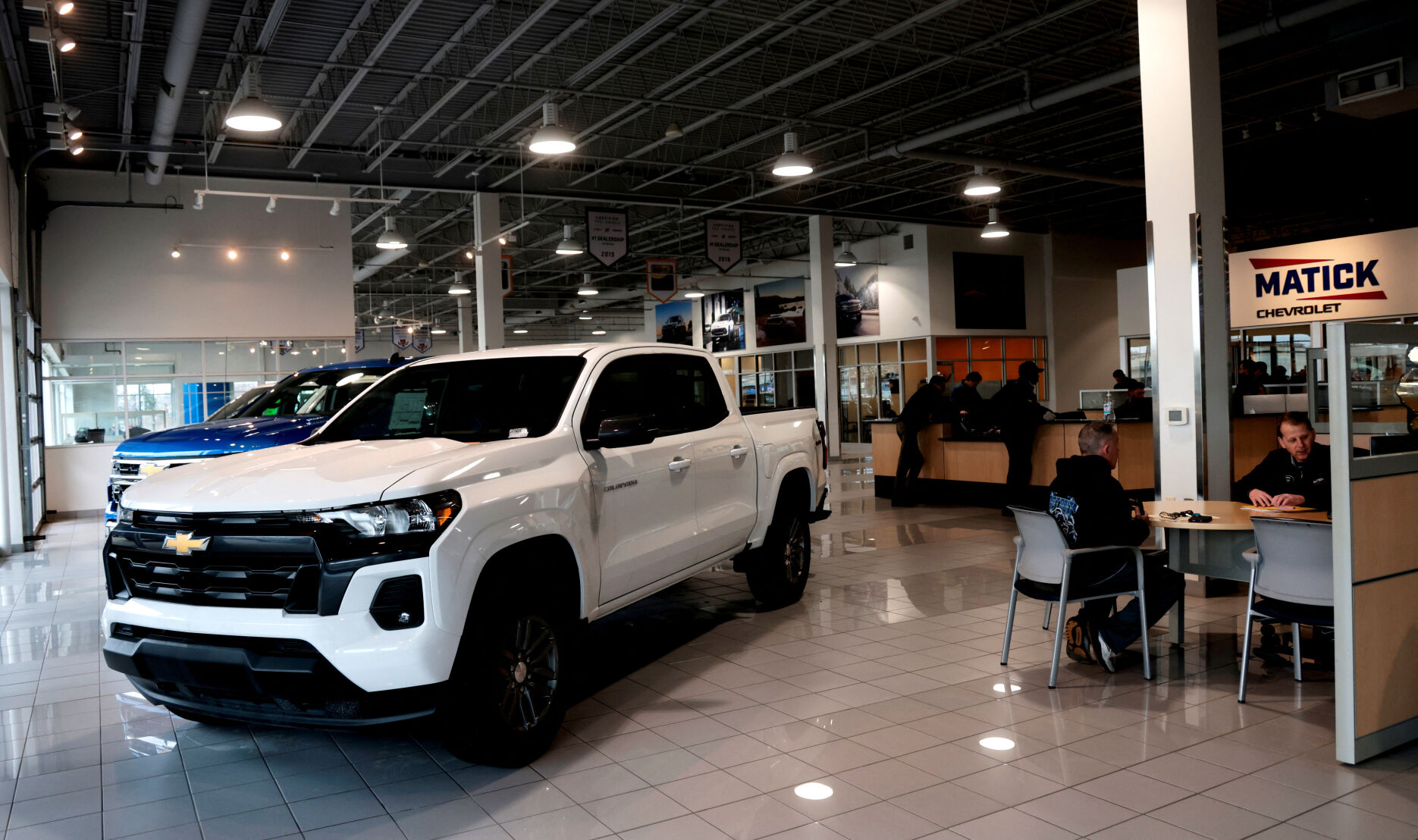 US consumers remained cautious about spending last month as inflation ticked higher